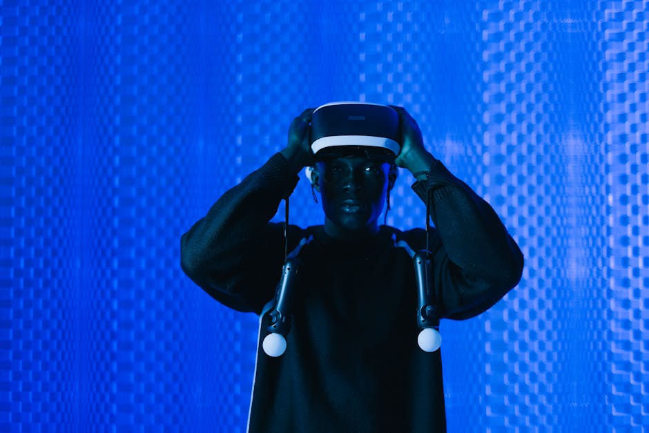 Man immersed in virtual reality using VR headset in a dynamic blue setting